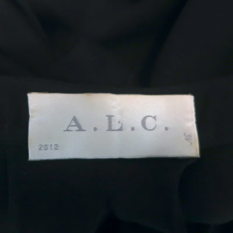 A.L.C. Haut sans manches à dos drapé en soie noire taille Très Petit col en V
