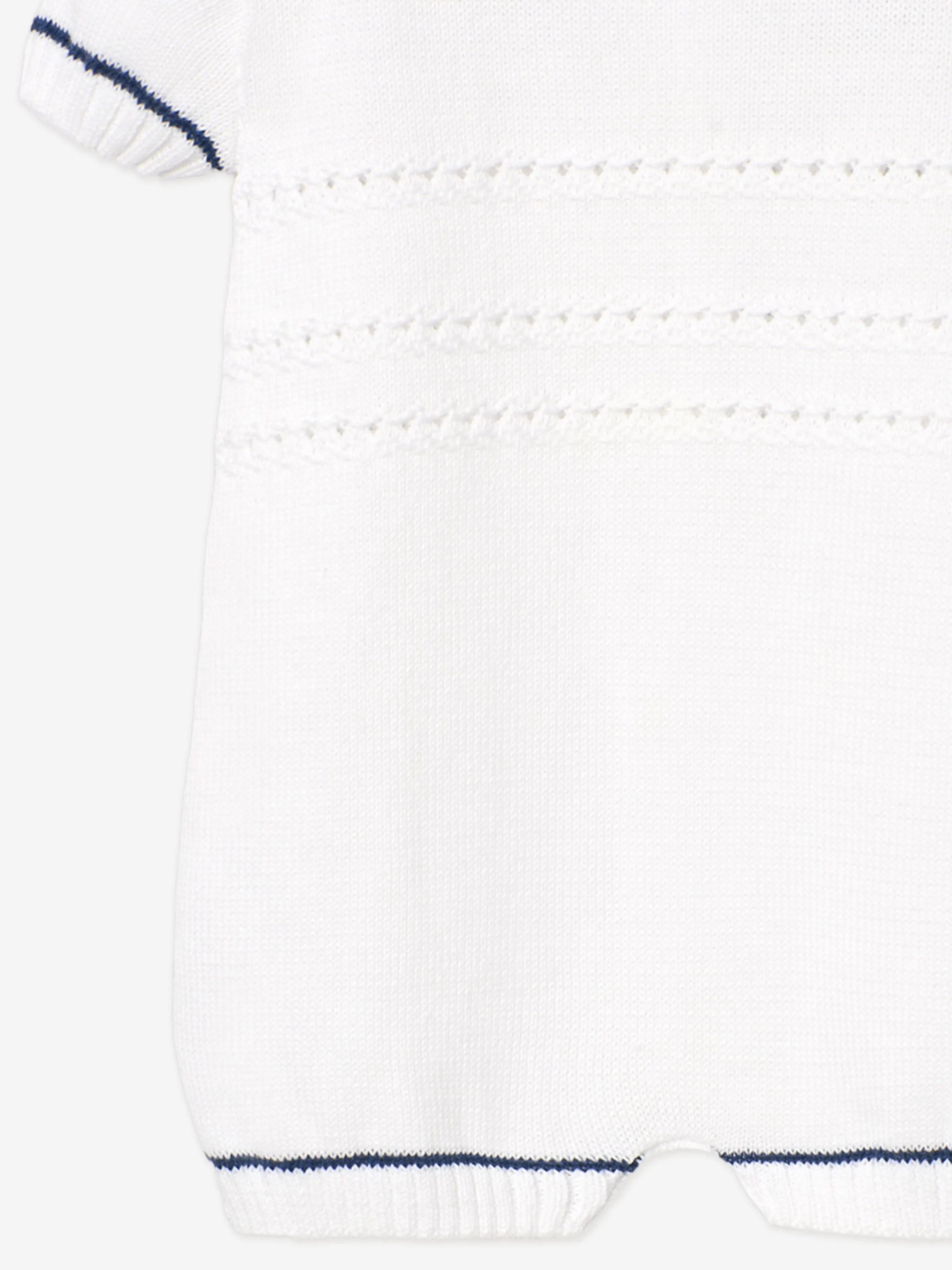 Barboteuse tricotée pour bébé garçon en blanc