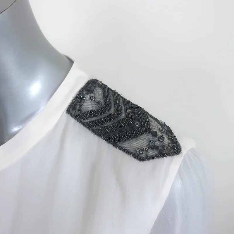 Brunello Cucinelli Blouse à épaulettes Monili en mousseline de soie blanche Taille Moyenne