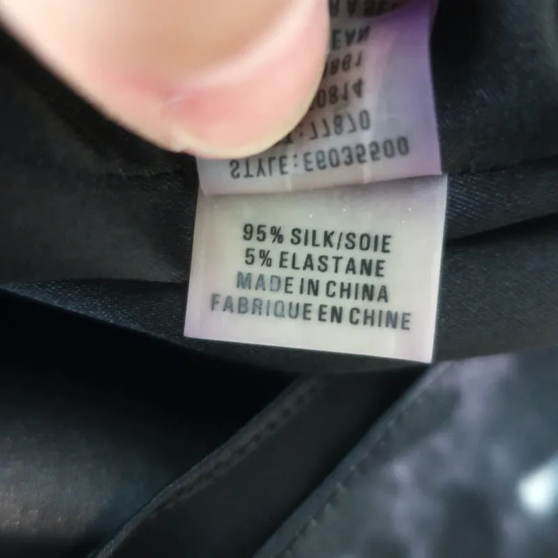 Elie Tahari Blouse sans manches Imprimé floral violet Soie extensible Taille S
