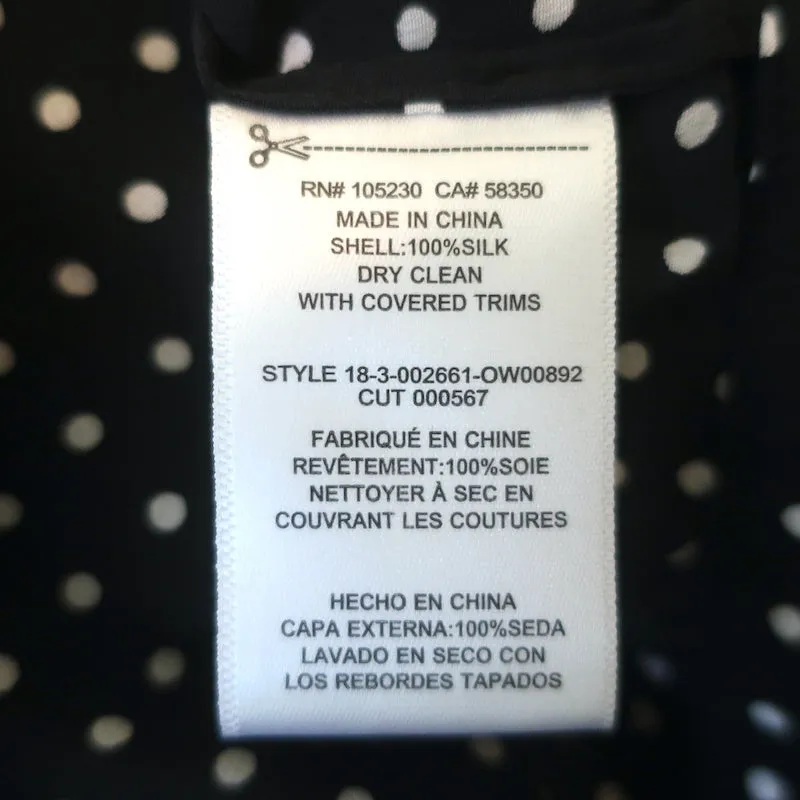Chemise à manches ballon Sola Equipment en soie à pois noirs et blancs Taille S