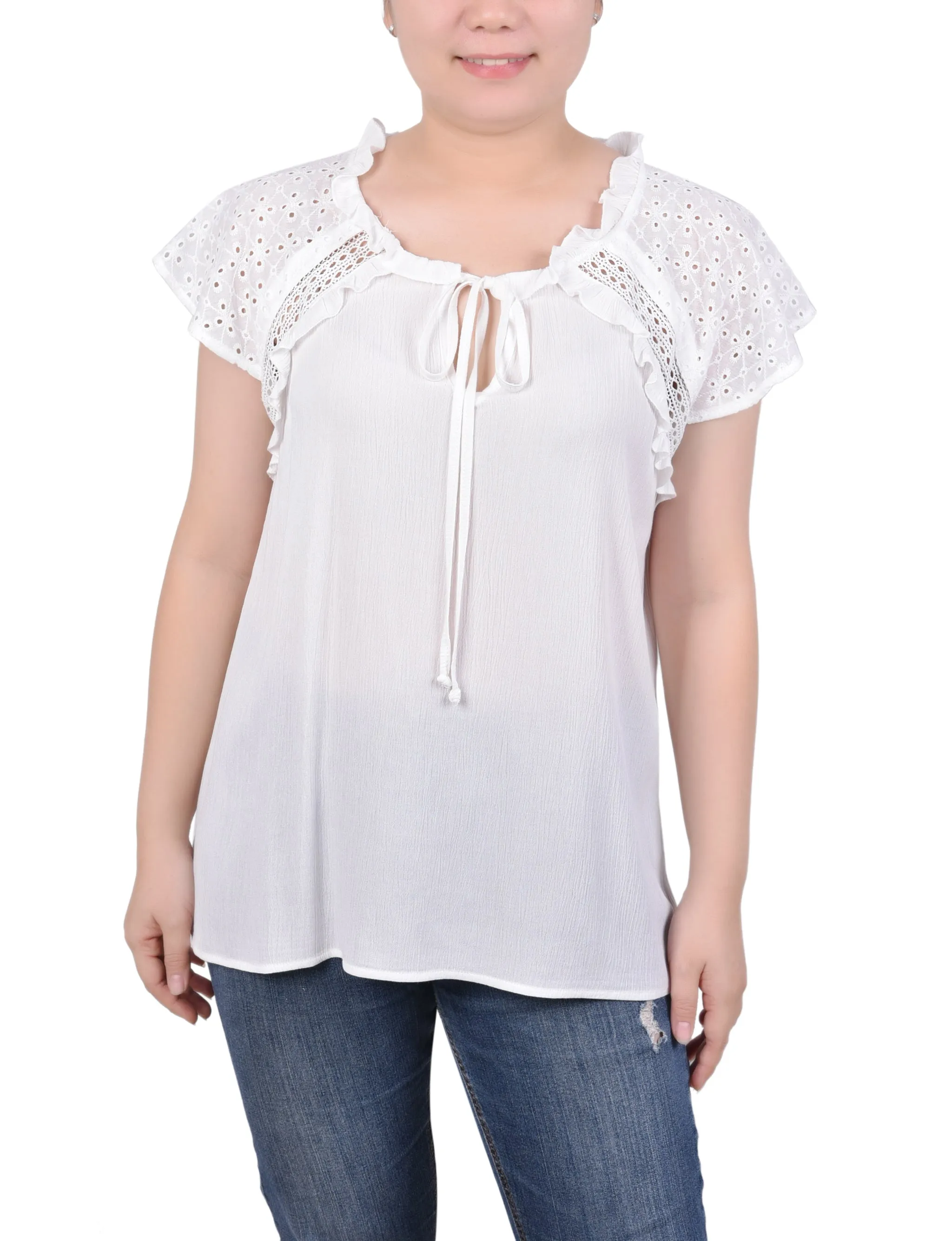 Blouse à manches œillet