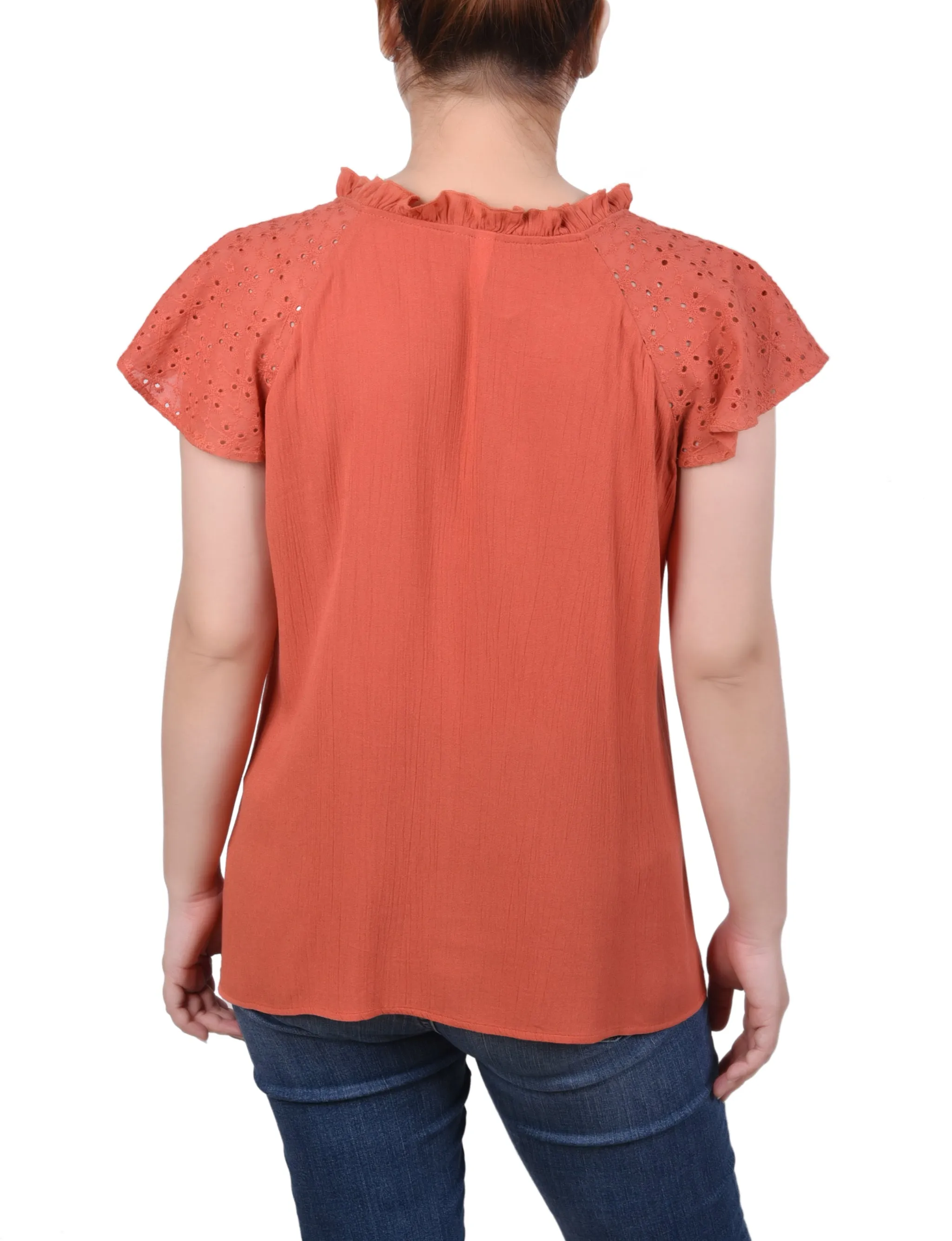 Blouse à manches œillet