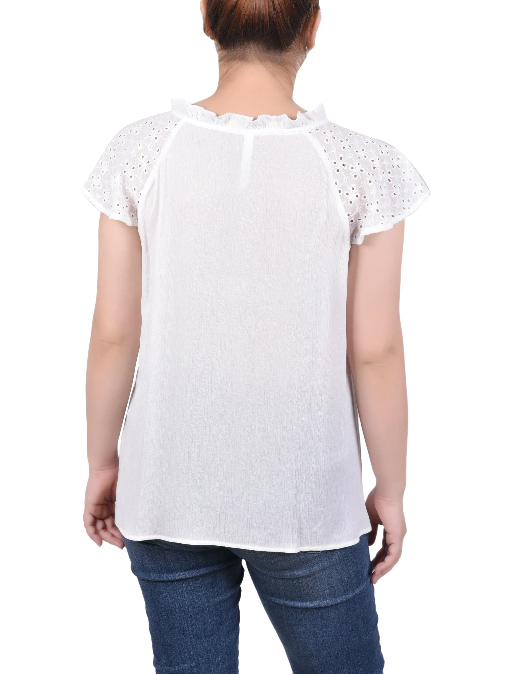 Blouse à manches œillet