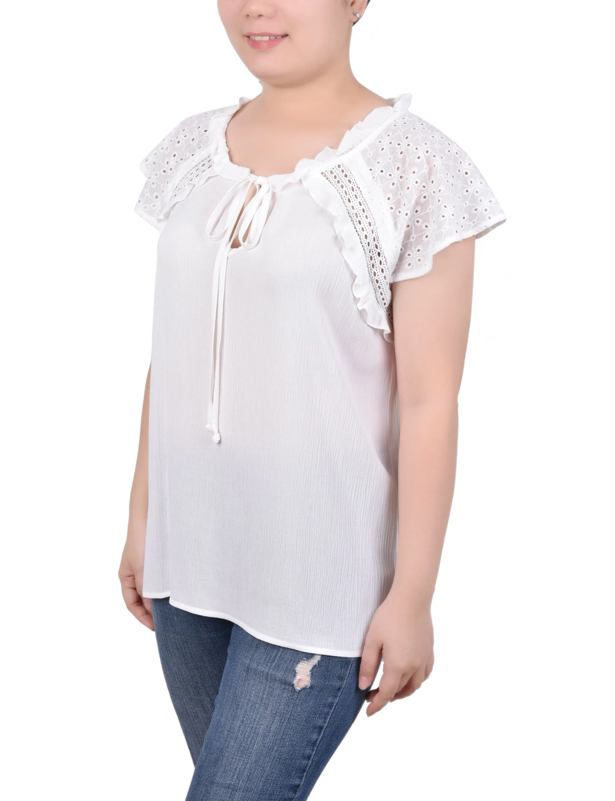 Blouse à manches œillet