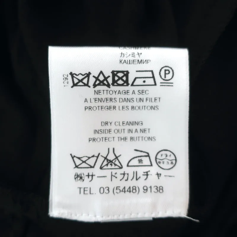 Givenchy Haut asymétrique à bouton-pression latéral Noir en jersey mélange cachemire Taille 38