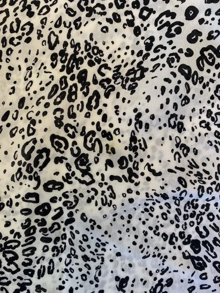 Haute Hippie Retour du Chemisier à Capuche Imprimé Léopard Blanc en Soie Taille Moyenne