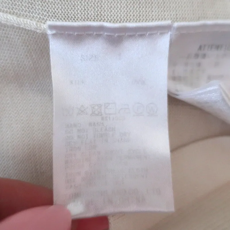 Haut à encolure en V manches courtes Knott en jersey de soie crème taille 1