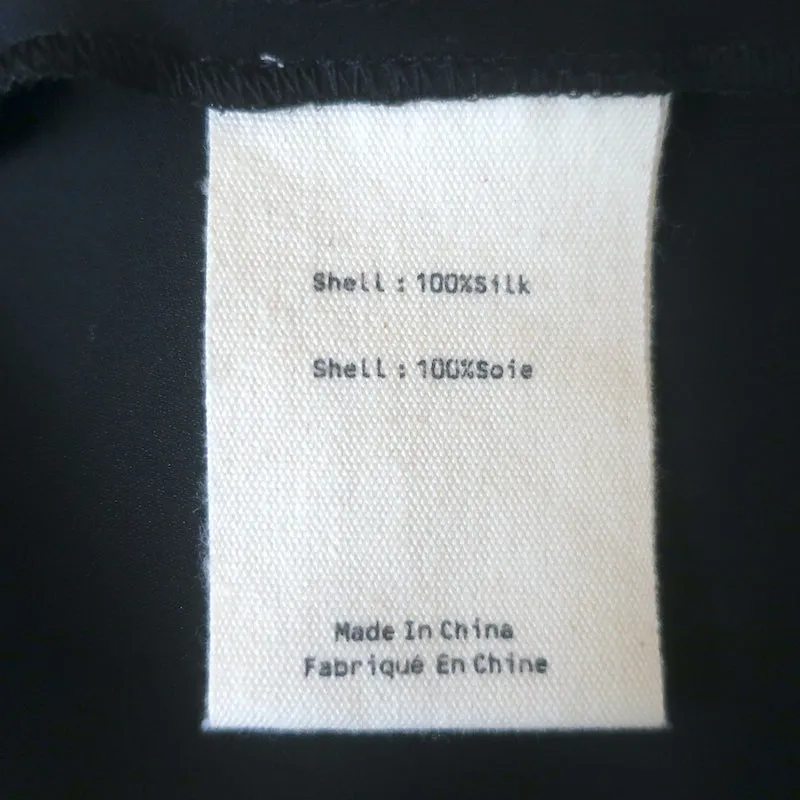 L'Agence Desa Blouse à Nœud Papillon Noir en Soie Taille Petite Haut à Manches à Volants