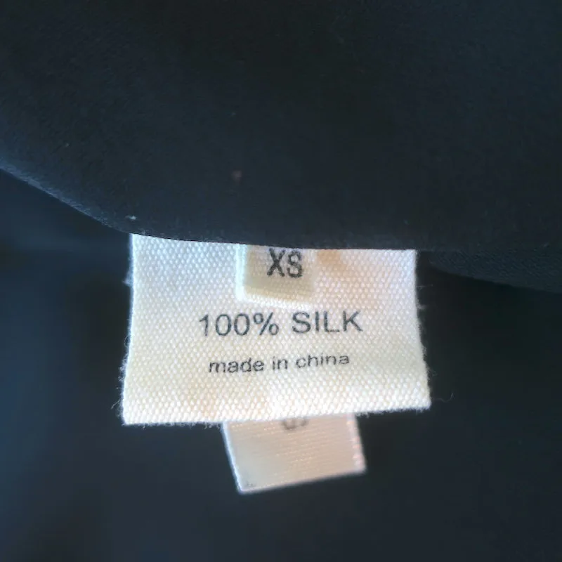 Haut drapé orné de strass en soie noire taille Extra Small