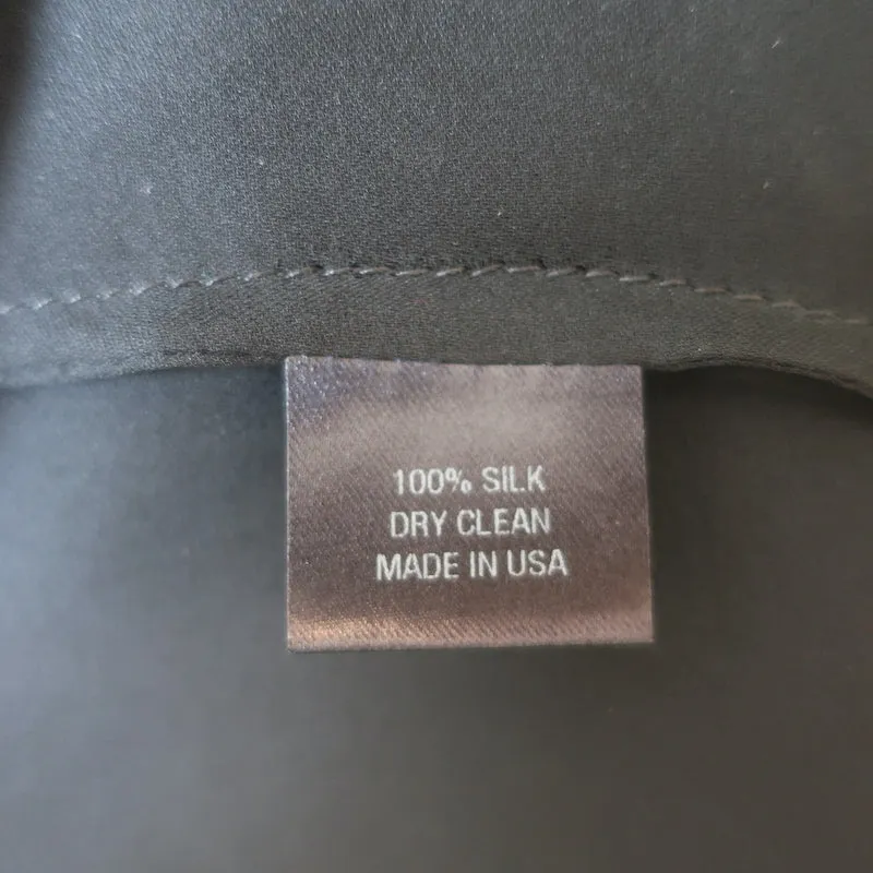 Nili Lotan Haut à liens croisés Noir Soie Taille Très Petit Blouse sans manches