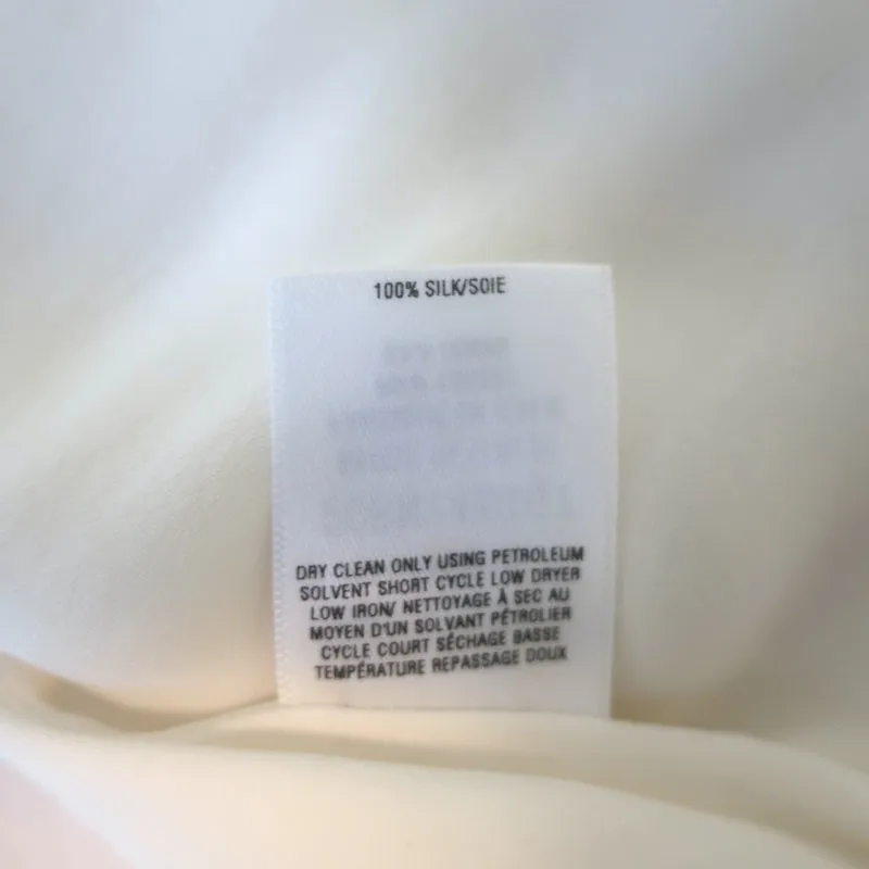 Oscar de La Renta Blouse à nœud papillon en soie ivoire Taille 6 Haut sans manches NEUF