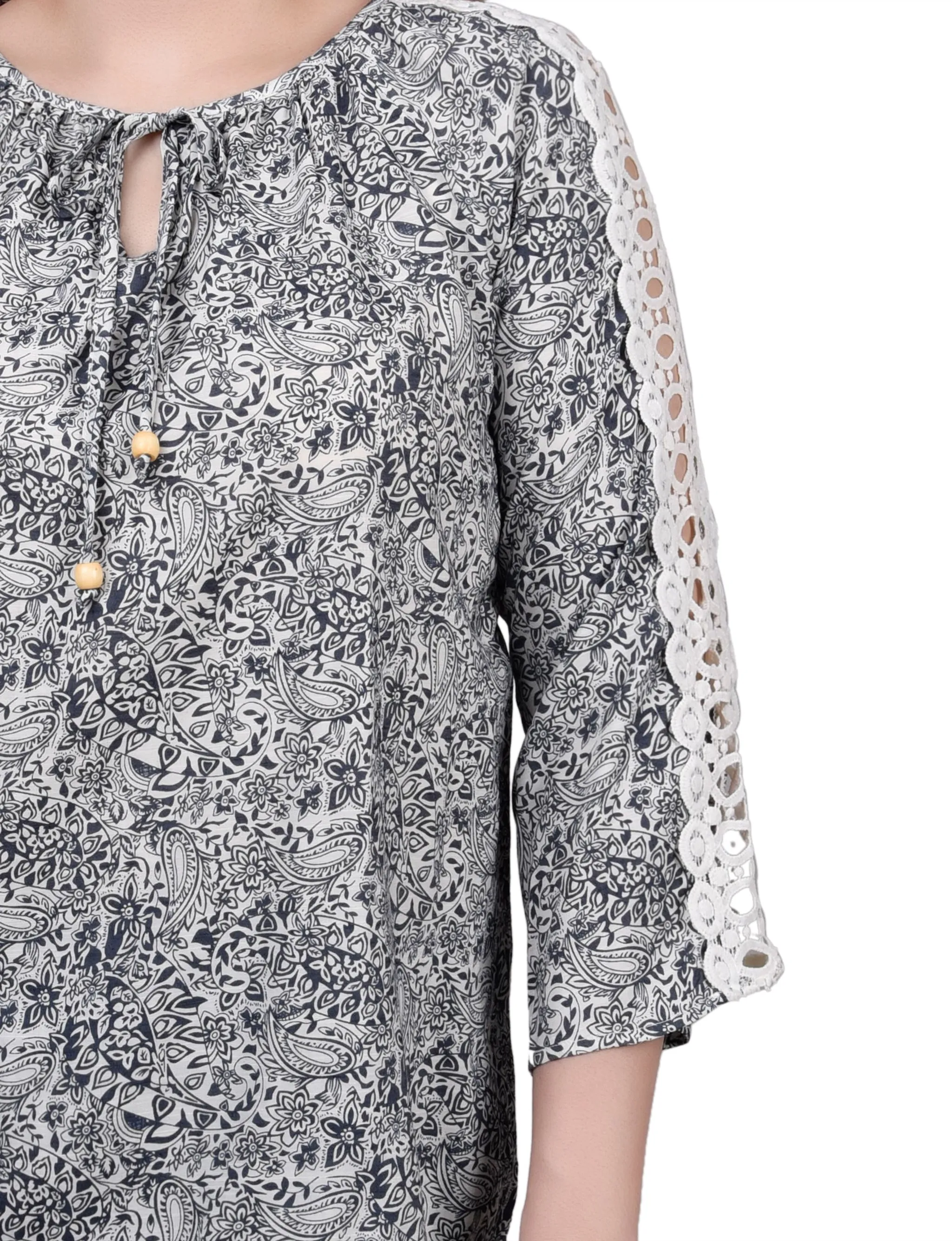 Blouse à détails crochetés avec manches 3/4