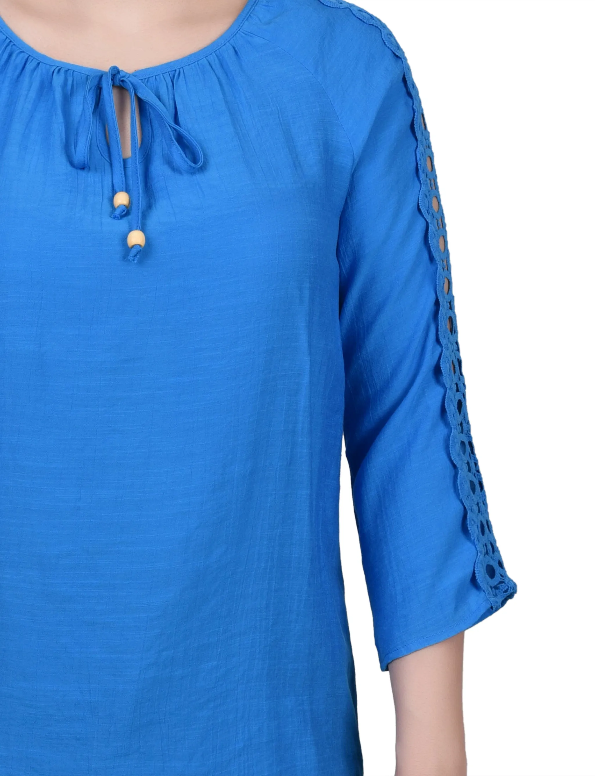 Blouse à détails crochetés avec manches 3/4
