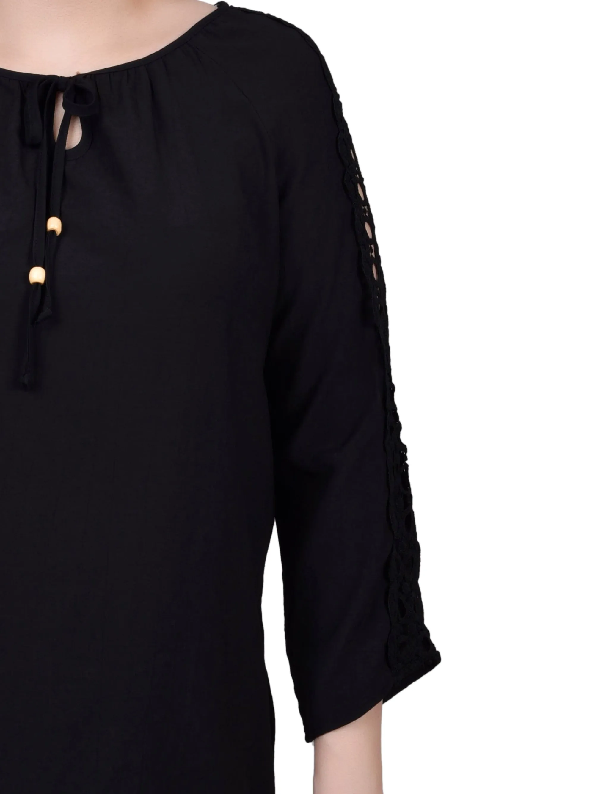 Blouse à détails crochetés avec manches 3/4