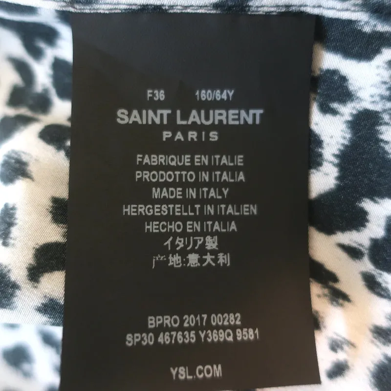 Saint Laurent Blouse sans manches à boutons en soie imprimée léopard Taille 36