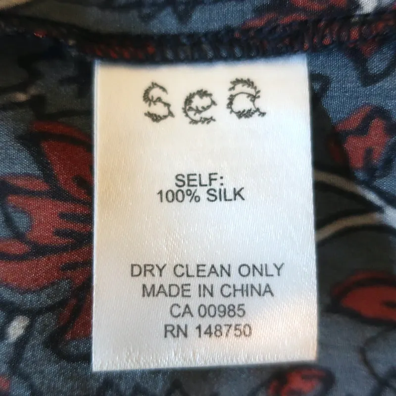 Haut sans manches SEA à volants marine en soie imprimée florale avec inserts en dentelle crochetée Taille 2