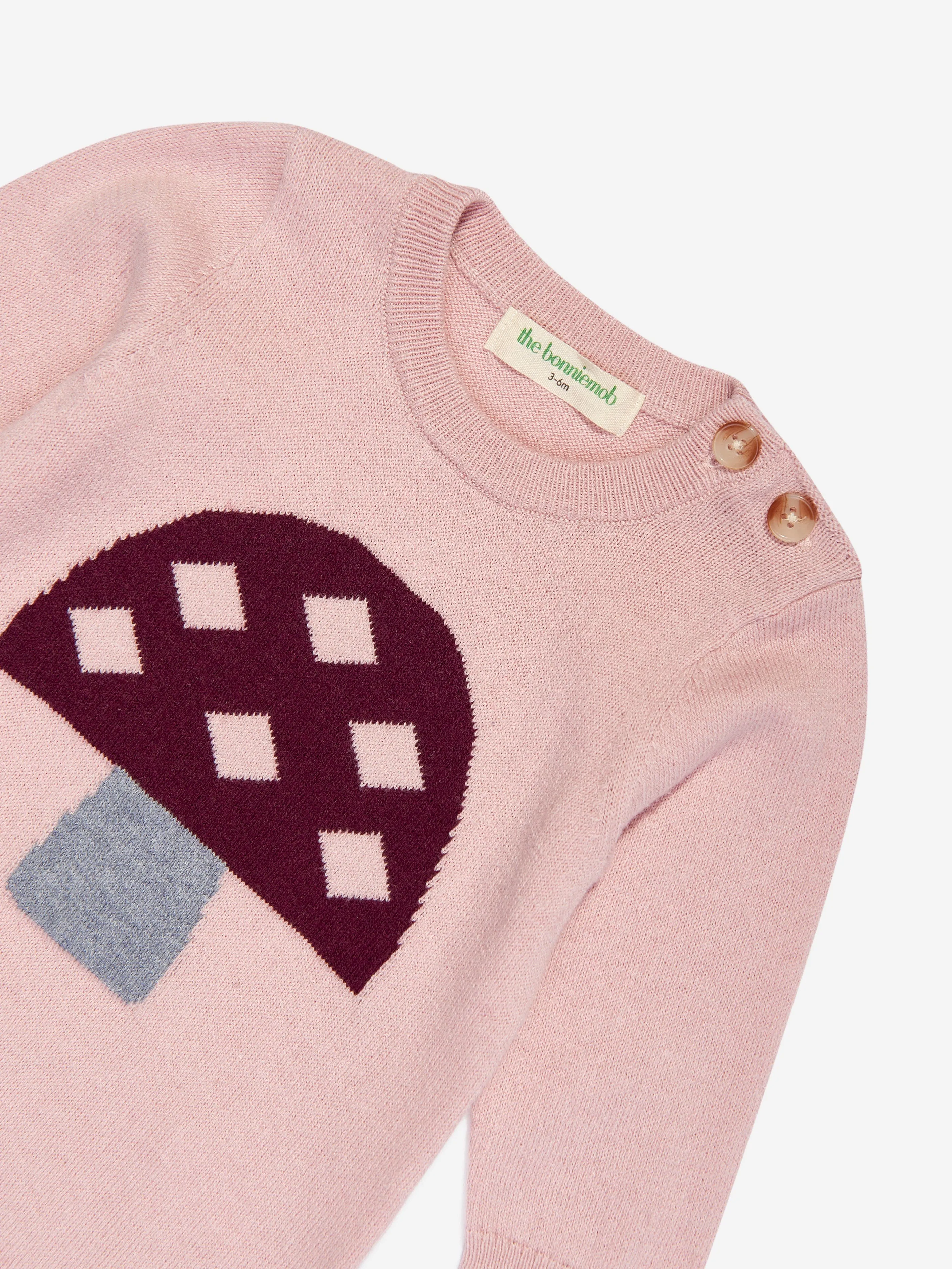 Le grenouillère tricotée champignon oseille pour bébé fille The Bonnie Mob en rose